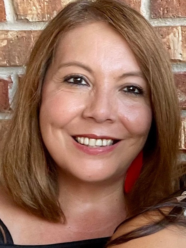 Head shot of female MaaPaa board member. Her name is Esperanza Hernandez who is a professional at Frost Bank.